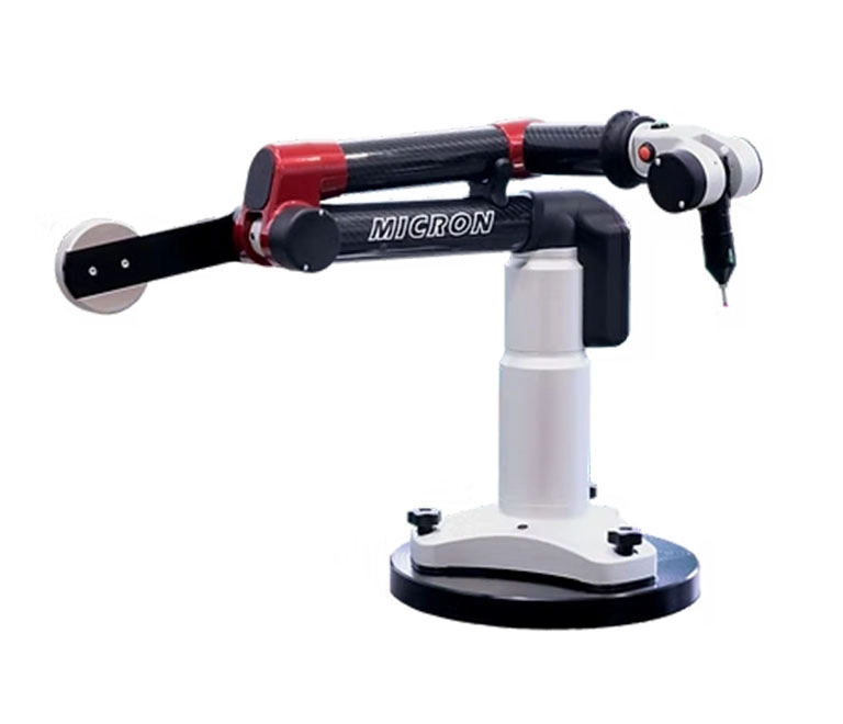 Tomelleri Engineering portable articulated measuring arm with touch probe, mounted on a magnetic base for dimensional inspection.